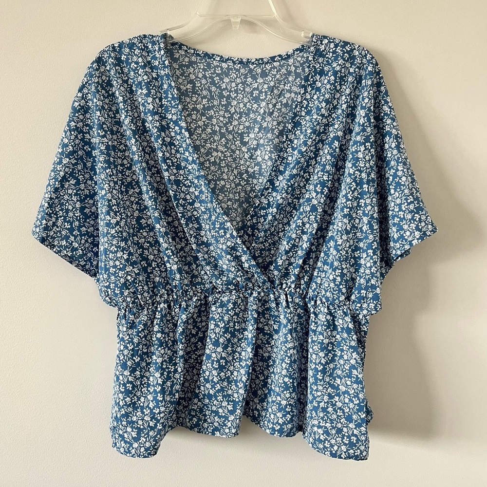 Blue floral wrap blouse